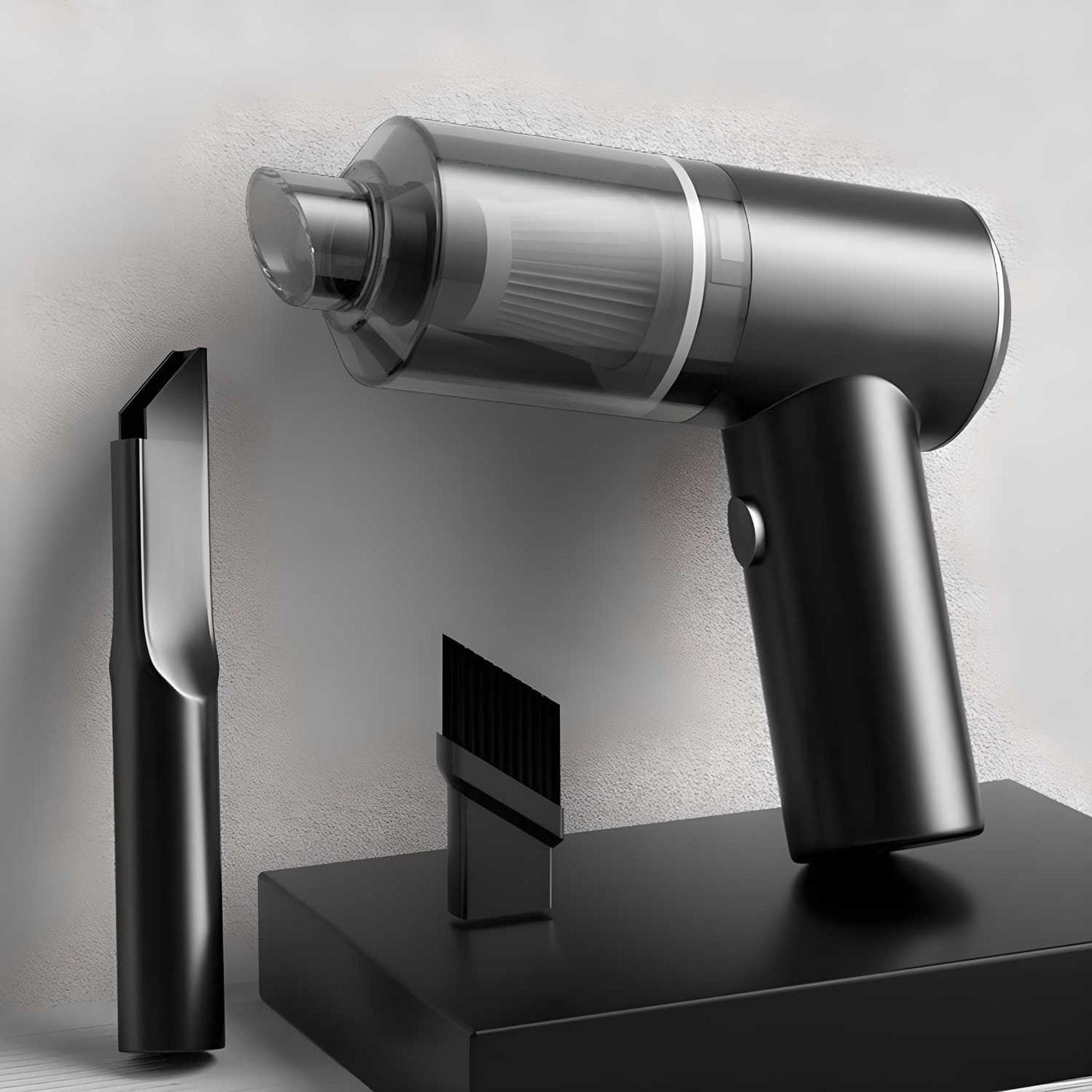 Black and silver handheld vacuum cleaner with attachments on a light gray background